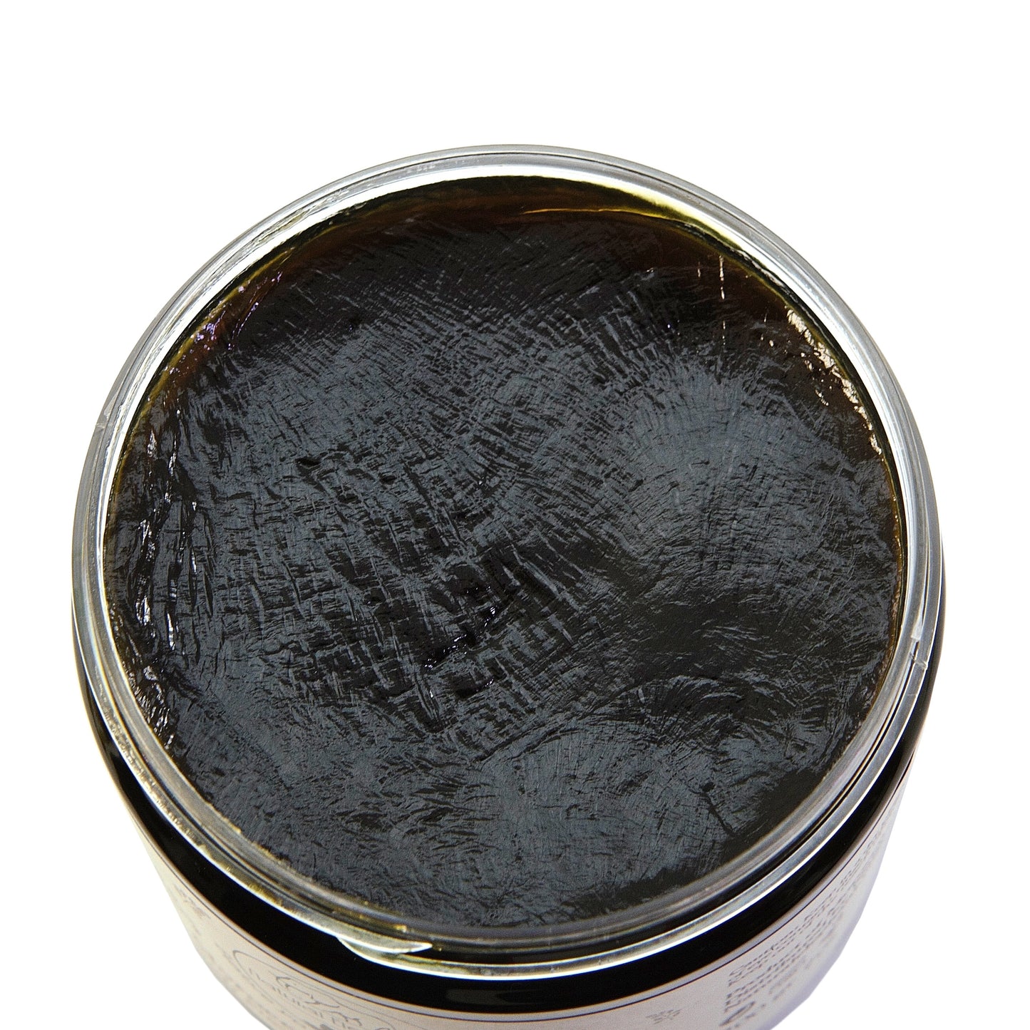 Open container of raw African black soap with a rich, dark texture. A natural cleanser popular for treating acne, pimples, and skin impurities.