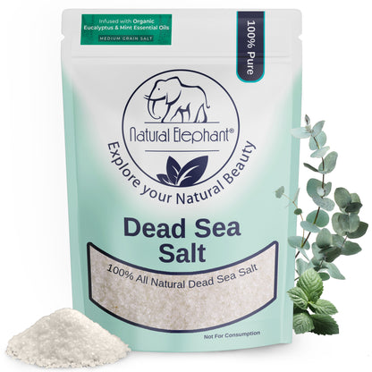 A resealable bag of Dead Sea Salt, ideal for Dead Sea salt baths and scrubs. Coarse salt granules and eucalyptus leaves are in the foreground.