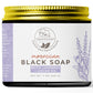 Close-up of African Black Soap, infused with lavender and argan oil. A traditional Moroccan black soap known for its deep cleansing and moisturizing properties. 7 oz container.