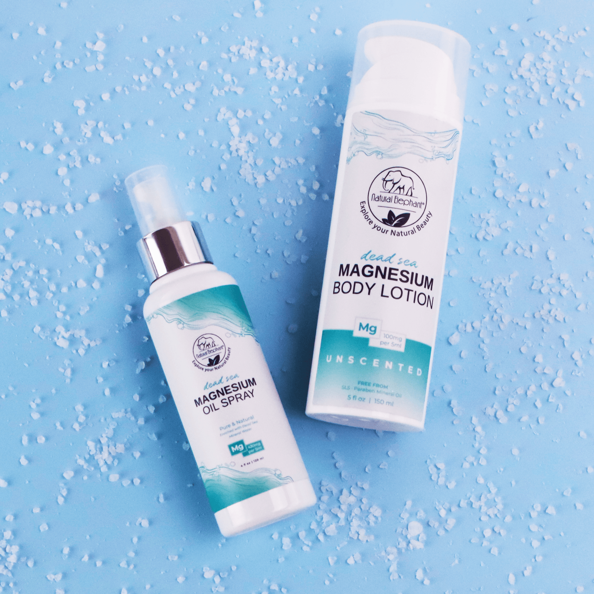 pure magnesium oil spray and lotion bottles on a textured blue surface. Infused with Dead Sea magnesium chloride, they promote skin nourishment and muscle recovery.
